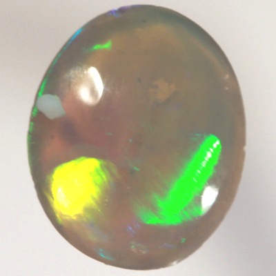 SOLID CRYSTAL OPAL Bright rolling flashes, green and yellow